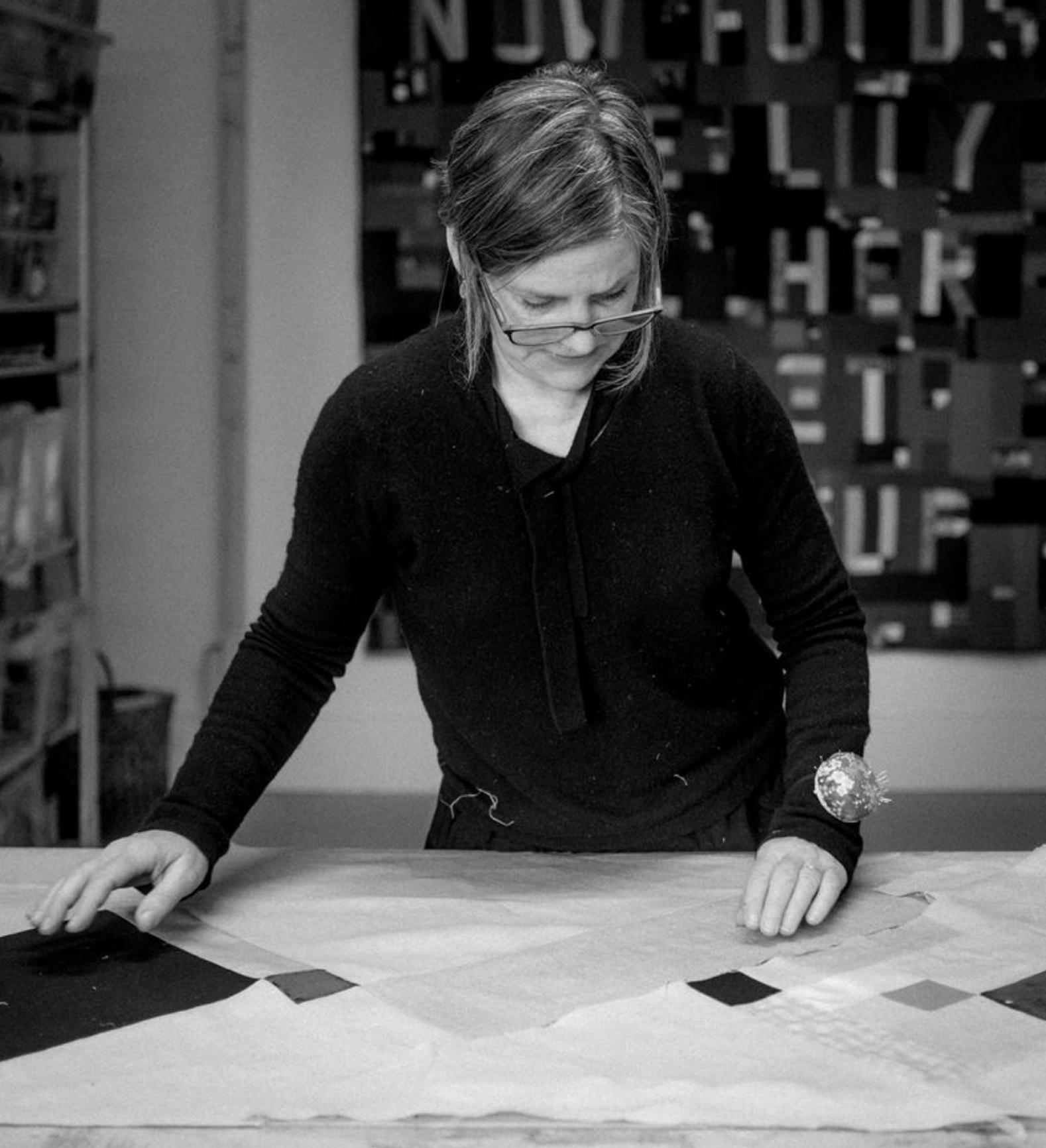 a person working on a textile project 